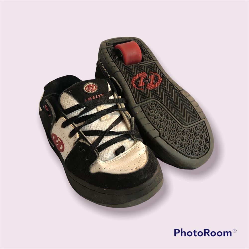 Size 12 Heelys black, white and red. With the wheels. True to size